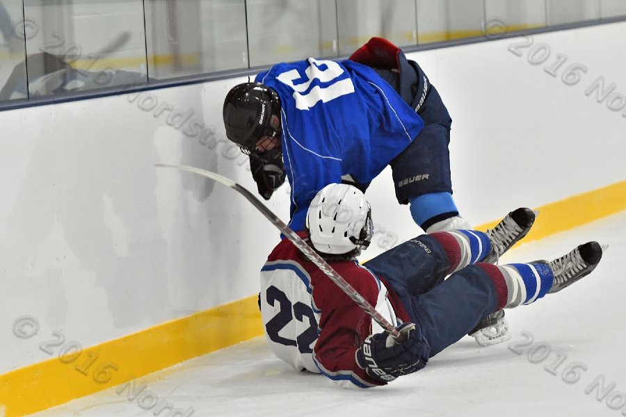 Wheaton College Men\'s Ice Hockey vs Middlesex Community College. - Photo By: KEITH NORDSTROM